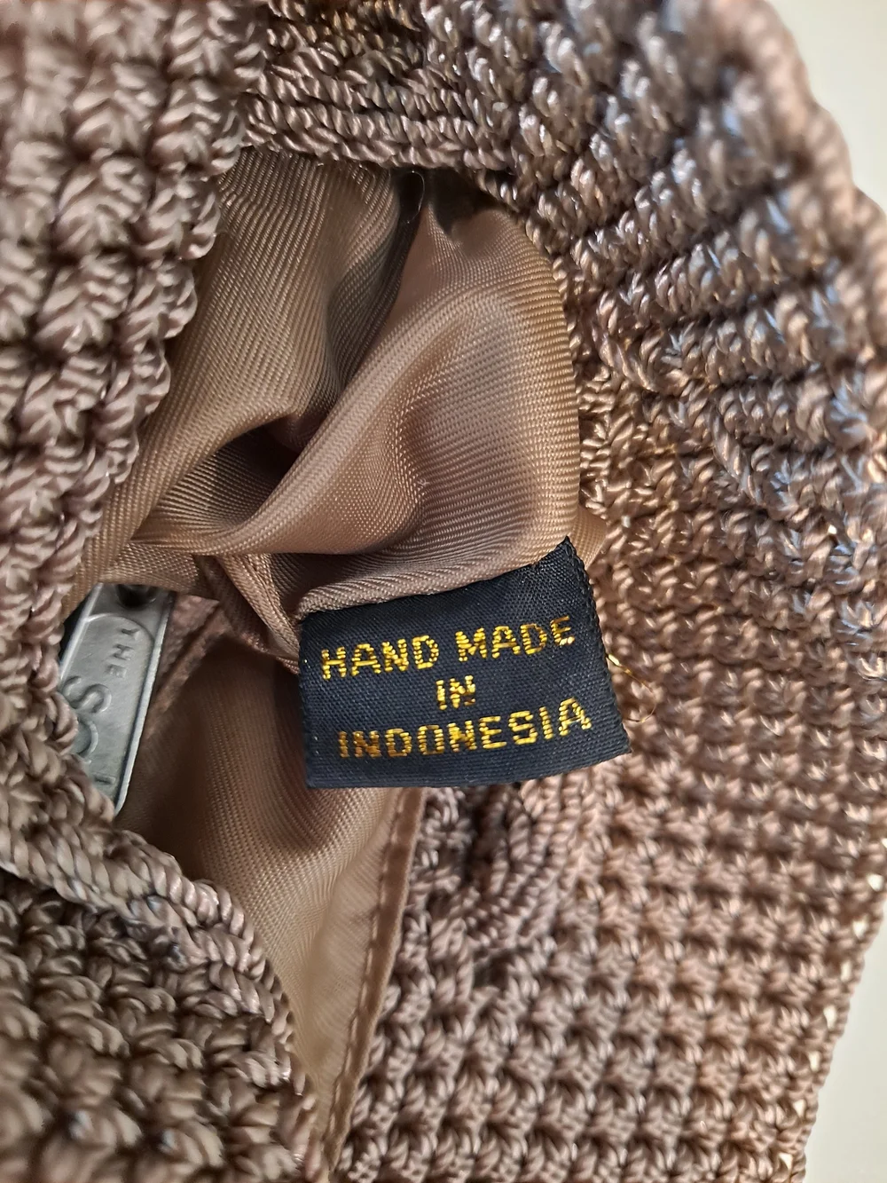 The Sak Brown Crochet Drawstring Mini Backpack